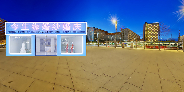 图中是一个户外场景，黄色的天空下方有一栋棕色的建筑，建筑的右侧有三个相同的白色长方形窗户，窗户中都展示着白色长条的物体。窗户的左右两侧分别是黄色、白色、灰色的建筑。画面的右侧有一条公交线路，但是时间是晚上，因此并没有公交车行驶，公交车站台上也没有人等候。